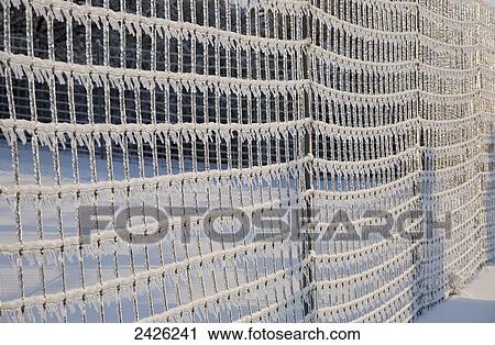 Icicles on a metal fence after a freezing rain storm; West Bolton, Quebec, Canada View Large Photo Image Stock Image - Icicles on a metal fence after a freezing rain storm; West Bolton, Quebec, Canada. Fotosearch
