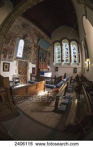Interior of a church with wooden pews and stained glass windows; Helmsley, North Yorkshire, England View Large Photo Image Stock Photograph - Interior of a church with wooden pews and stained glass windows; Helmsley, North Yorkshire, England. Fotosearch