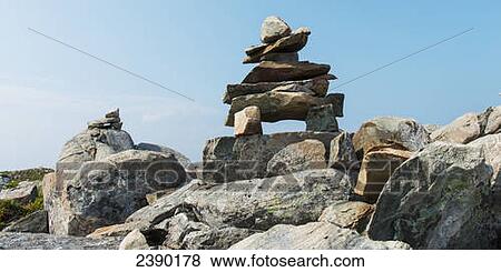 Inukshuk on the rocks; Bonavista, Newfoundland and Labrador, Canada View Large Photo Image Stock Photo - Inukshuk on the rocks; Bonavista, Newfoundland and Labrador, Canada. Fotosearch