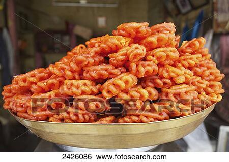 Jalebi in a sweet shop; Hyderabad, Andhra Pradesh, India View Large Photo Image Stock Photograph - Jalebi in a sweet shop; Hyderabad, Andhra Pradesh, India. Fotosearch