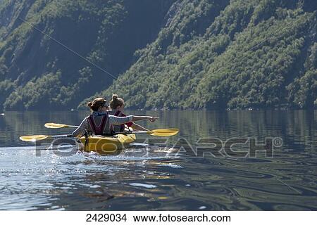Picture - Kayaking in Gros Morne National Park; Trout River, Newfoundland, Canada. Fotosearch