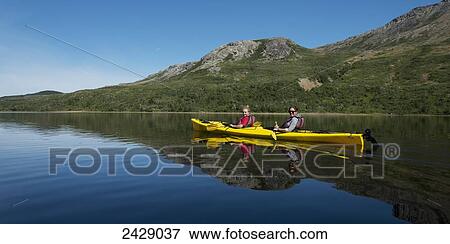 Stock Photo - Kayaking in Gros Morne National Park; Trout River, Newfoundland, Canada. Fotosearch