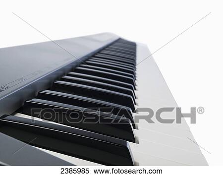 Keys on a piano keyboard View Large Photo Image Stock Photography - Keys on a piano keyboard. Fotosearch