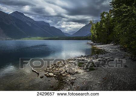Stock Photo - Lake MacDonald in Glacier National Park; Montana, United States of America. Fotosearch