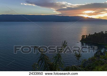 Lake Toba at sunset, North Sumatra, Indonesia View Large Photo Image Stock Image - Lake Toba at sunset, North Sumatra, Indonesia. Fotosearch