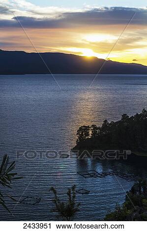 Lake Toba at sunset, North Sumatra, Indonesia View Large Photo Image Stock Image - Lake Toba at sunset, North Sumatra, Indonesia. Fotosearch