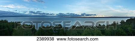 Stock Photo - Lake Winnipeg in Hecla-Grindstone Provincial Park at sunset; Riverton, Manitoba, Canada. Fotosearch