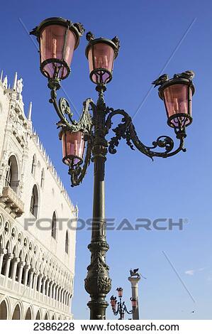 Lamp post and building in Piazza San Marco; Venice, Veneto, Italy View Large Photo Image Stock Photo - Lamp post and building in Piazza San Marco; Venice, Veneto, Italy. Fotosearch