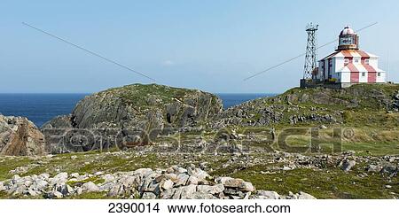 Picture - Lighthouse and building along the atlantic coast; Bonavista, Newfoundland and Labrador, Canada. Fotosearch