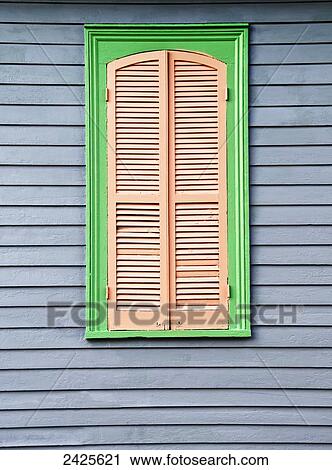 Stock Image - Louisiana, New Orleans, Detail shot of a colorful home.. Fotosearch