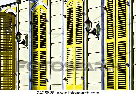 Louisiana, New Orleans, Exterior of a bright yellow home. View Large Photo Image Stock Photo - Louisiana, New Orleans, Exterior of a bright yellow home.. Fotosearch
