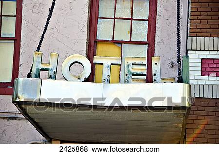 Stock Photo - Louisiana, New Orleans, Signage for a run down Hotel.. Fotosearch
