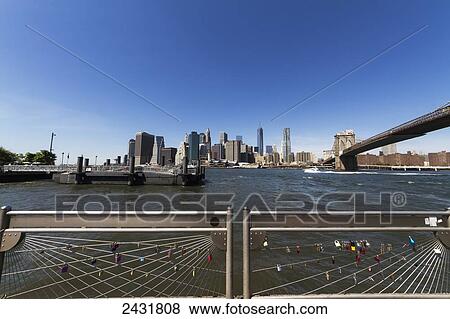 Lower Manhattan and Brooklyn Bridge, New York City, New York, United States View Large Photo Image Stock Photo - Lower Manhattan and Brooklyn Bridge, New York City, New York, United States. Fotosearch
