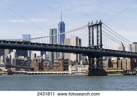 Lower Manhattan and Williamsburg Bridge, as seen from the East River, New York City, New York, United States View Large Photo Image Stock Image - Lower Manhattan and Williamsburg Bridge, as seen from the East River, New York City, New York, United States. Fotosearch