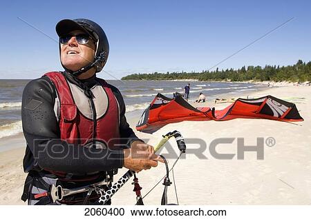 Man Kite Boarding, Victoria Beach, Manitoba View Large Photo Image Stock Image - Man Kite Boarding, Victoria Beach, Manitoba. Fotosearch