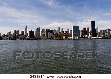 Manhattan skyline, as seen from the East River, New York City, New York, United States View Large Photo Image Picture - Manhattan skyline, as seen from the East River, New York City, New York, United States. Fotosearch