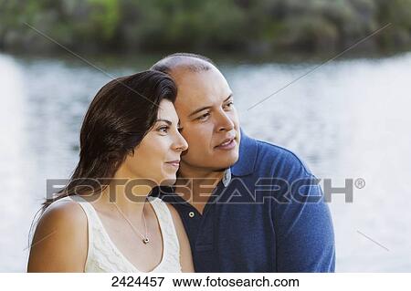 Married couple in a park spending quality time together; Edmonton, Alberta, Canada View Large Photo Image Stock Photo - Married couple in a park spending quality time together; Edmonton, Alberta, Canada. Fotosearch