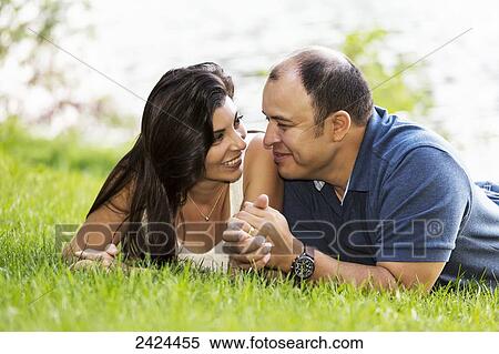 Married couple in a park spending quality time together; Edmonton, Alberta, Canada View Large Photo Image Stock Photography - Married couple in a park spending quality time together; Edmonton, Alberta, Canada. Fotosearch