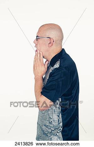 Middle-aged bald man wearing eyeglasses with a look of shock on his face; Connecticut, United States of America View Large Photo Image Stock Photograph - Middle-aged bald man wearing eyeglasses with a look of shock on his face; Connecticut, United States of America. Fotosearch