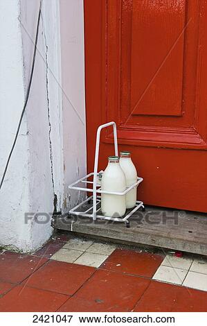 Milk delivery to the door; London, England View Large Photo Image Stock Photo - Milk delivery to the door; London, England. Fotosearch