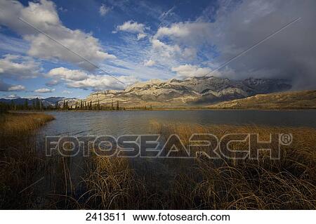 Mixed weather over Talbot Lake; Alberta, Canada View Large Photo Image Stock Image - Mixed weather over Talbot Lake; Alberta, Canada. Fotosearch