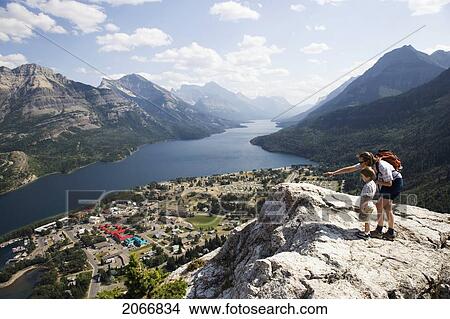 Mother And Child Enjoy View At Waterton Lakes National Park, Alberta Canada View Large Photo Image Picture - Mother And Child Enjoy View At Waterton Lakes National Park, Alberta Canada. Fotosearch