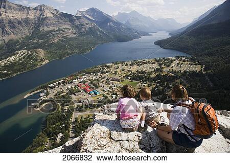 Mother And Children Enjoy View At Waterton Lakes National Park, Alberta Canada View Large Photo Image Stock Image - Mother And Children Enjoy View At Waterton Lakes National Park, Alberta Canada. Fotosearch