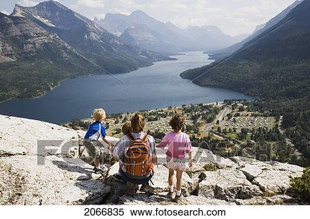 Mother And Children Enjoy View At Waterton Lakes National Park, Alberta Canada View Large Photo Image Stock Photography - Mother And Children Enjoy View At Waterton Lakes National Park, Alberta Canada. Fotosearch