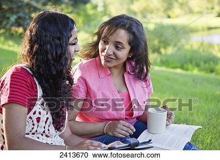 Mother and daughter spending quality time together in park; Edmonton, Alberta, Canada View Large Photo Image Stock Image - Mother and daughter spending quality time together in park; Edmonton, Alberta, Canada. Fotosearch