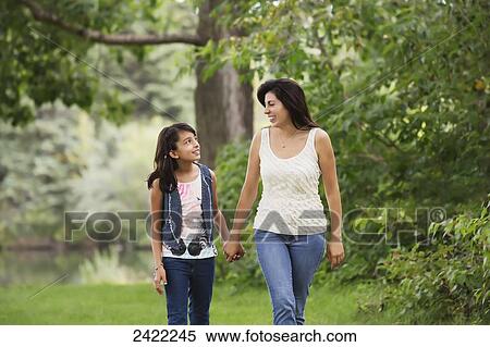 Stock Photography - Mother and daughter spending quality time together in a park; Edmonton, Alberta, Canada. Fotosearch