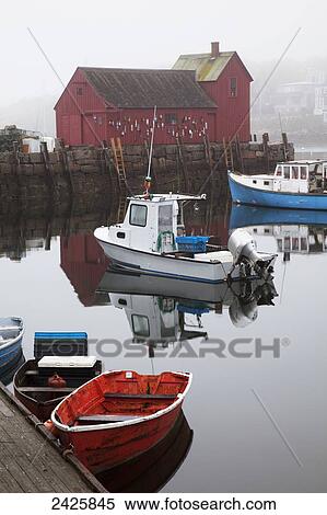 New England, Massachusetts, Close up of small boats in the Rockport Harbor, Red building in background. View Large Photo Image Stock Photography - New England, Massachusetts, Close up of small boats in the Rockport Harbor, Red building in background.. Fotosearch