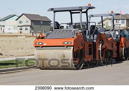 Stock Image - New home construction and road development; Edmonton, Alberta, Canada. Fotosearch