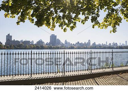 New York City skyline from Central Park; New York City, New York, United States of America View Large Photo Image Stock Photograph - New York City skyline from Central Park; New York City, New York, United States of America. Fotosearch