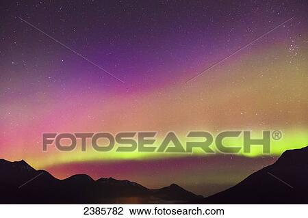 Northern Lights in the sky above Moose Pass, silhouetted Kenai Mountains in the foreground, Chugach National Forest; Alaska, United States of America View Large Photo Image Stock Image - Northern Lights in the sky above Moose Pass, silhouetted Kenai Mountains in the foreground, Chugach National Forest; Alaska, United States of America. Fotosearch