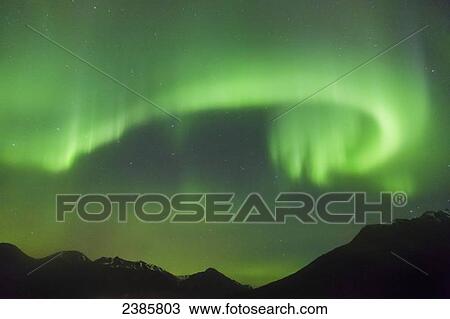 Northern Lights in the sky above Moose Pass, with silhouetted Kenai Mountains in the fog and low cloud, Chugach National Forest; Moose Pass, Alaska, United States of America View Large Photo Image Stock Image - Northern Lights in the sky above Moose Pass, with silhouetted Kenai Mountains in the fog and low cloud, Chugach National Forest; Moose Pass, Alaska, United States of America. Fotosearch
