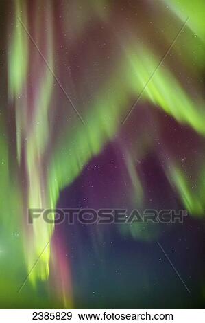 Stock Photo - Northern Lights in the sky above the Tony Knowles Coastal Trail, Anchorage Coastal Refuge; Anchorage, Alaska, United States of America. Fotosearch