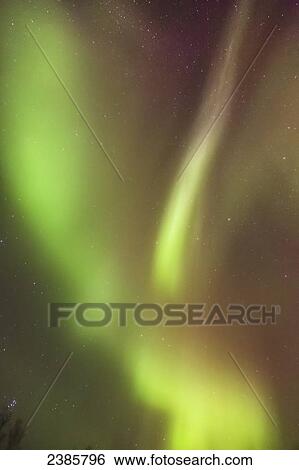 Stock Photograph - Northern Lights in the sky above the Kenai Peninsula, Chugach National Forest; Moose Pass, Alaska, United States of America. Fotosearch