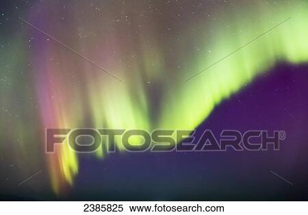 Stock Photography - Northern Lights in the sky above the Tony Knowles Coastal Trail, Anchorage Coastal Refuge; Anchorage, Alaska, United States of America. Fotosearch