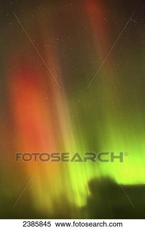 Northern Lights in the sky above the Tony Knowles Coastal Trail; Alaska, United States of America View Large Photo Image Stock Photography - Northern Lights in the sky above the Tony Knowles Coastal Trail; Alaska, United States of America. Fotosearch