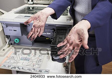 Office worker trying to replace a toner cartridge in a photocopier; Edmonton, Alberta, Canada View Large Photo Image Stock Image - Office worker trying to replace a toner cartridge in a photocopier; Edmonton, Alberta, Canada. Fotosearch