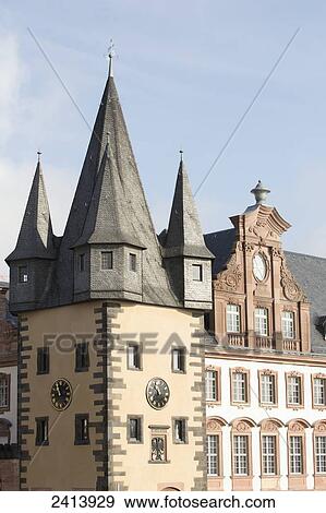 Stock Photo - Old medieval turret with clock and blue sky; Frankfurt am Main, Germany. Fotosearch