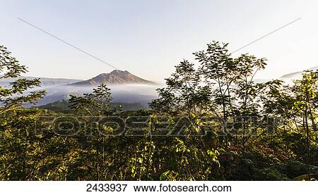 Stock Photo - Panoramic view of Mount Batur from Kintamani, Bali, Indonesia. Fotosearch