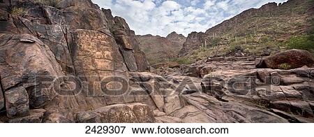 Petroglyphs at the Hieroglyphic Canyon Trail, at Gold Canyon, Superstition Mountain Range; Arizona, United States of America View Large Photo Image Stock Photo - Petroglyphs at the Hieroglyphic Canyon Trail, at Gold Canyon, Superstition Mountain Range; Arizona, United States of America. Fotosearch