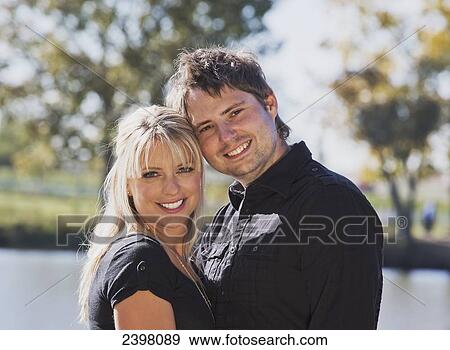 Portrait of a couple; Edmonton, Alberta, Canada View Large Photo Image Stock Photo - Portrait of a couple; Edmonton, Alberta, Canada. Fotosearch