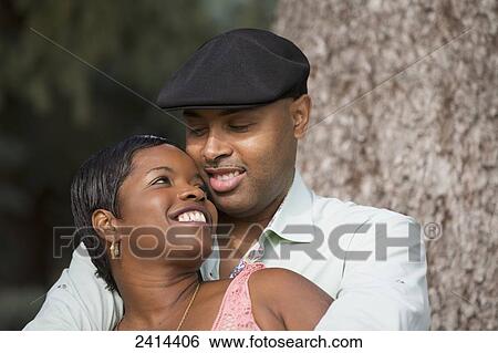 Portrait of a couple in a park; Edmonton, Alberta, Canada View Large Photo Image Stock Photograph - Portrait of a couple in a park; Edmonton, Alberta, Canada. Fotosearch