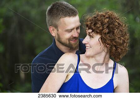 Portrait of a couple; Stony Plain, Alberta, Canada View Large Photo Image Stock Image - Portrait of a couple; Stony Plain, Alberta, Canada. Fotosearch