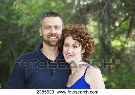 Stock Image - Portrait of a couple; Stony Plain, Alberta, Canada. Fotosearch