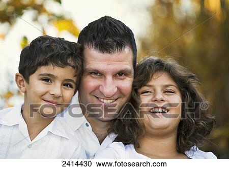 Portrait of a father with his son and daughter in a park; Edmonton, Alberta, Canada View Large Photo Image Stock Image - Portrait of a father with his son and daughter in a park; Edmonton, Alberta, Canada. Fotosearch