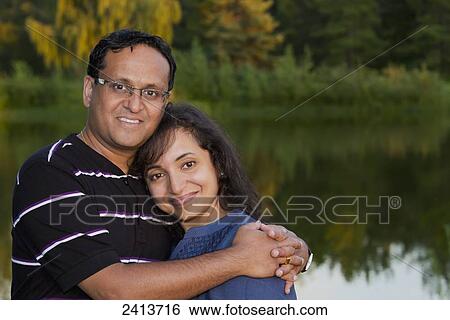 Portrait of a married couple in a park in autumn; Edmonton, Alberta, Canada View Large Photo Image Stock Photograph - Portrait of a married couple in a park in autumn; Edmonton, Alberta, Canada. Fotosearch
