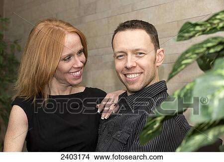 Portrait of a married couple, wife with a disability; Edmonton, Alberta, Canada View Large Photo Image Picture - Portrait of a married couple, wife with a disability; Edmonton, Alberta, Canada. Fotosearch
